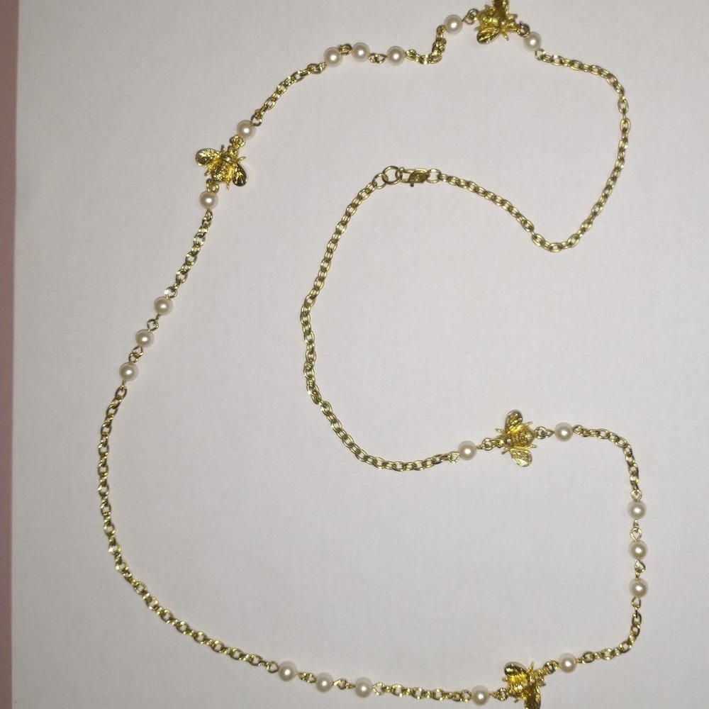 Gold toned bee necklace